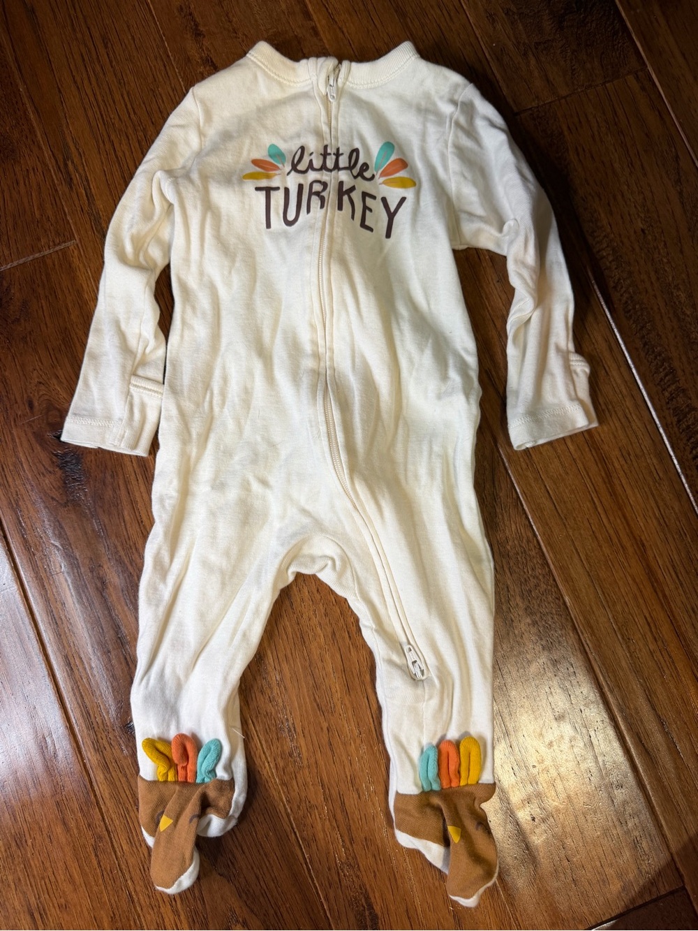 Old Navy Cream Footed One-Piece with Colorful Feather Accents